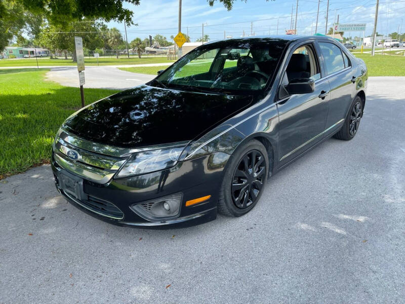 2011 Ford Fusion for sale at LLAPI MOTORS in Hudson FL