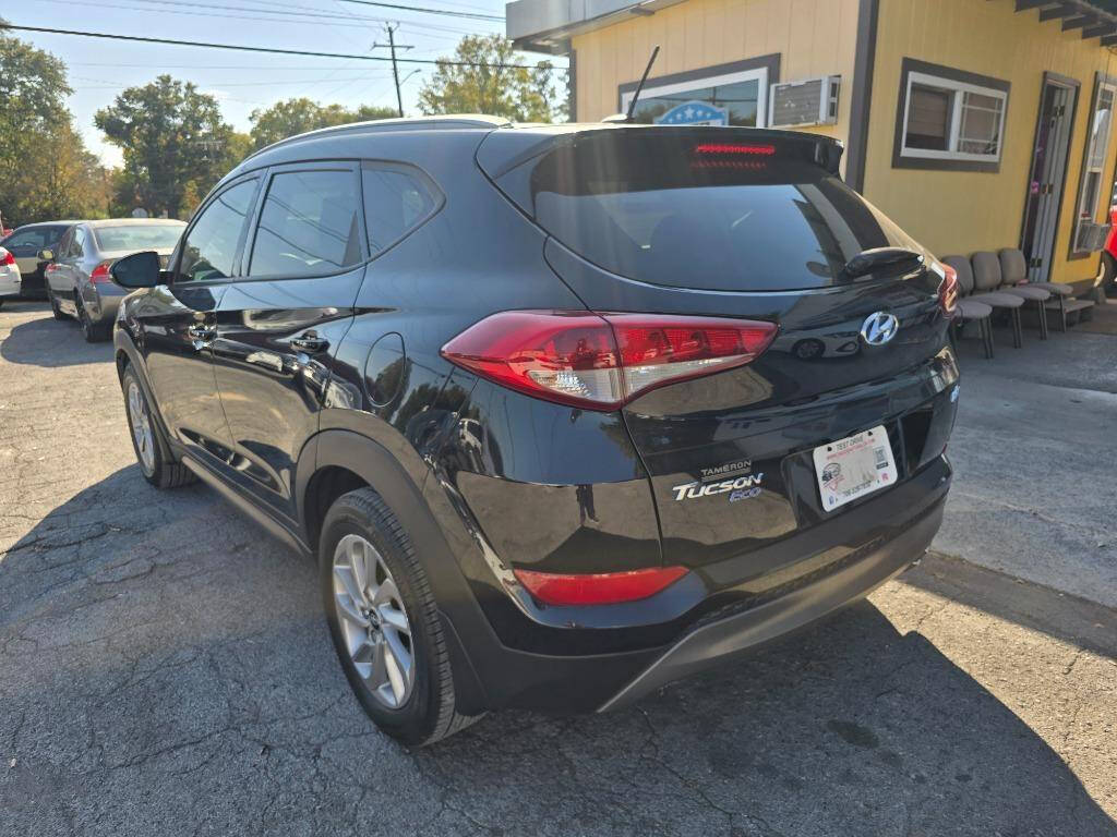 2016 Hyundai TUCSON for sale at DAGO'S AUTO SALES LLC in Dalton, GA