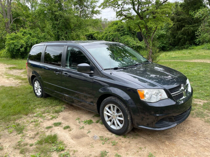2014 Dodge Grand Caravan for sale at Homeland Motors INC in Winchester VA