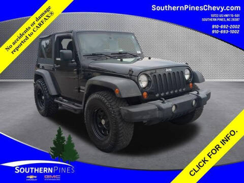 2012 Jeep Wrangler for sale at PHIL SMITH AUTOMOTIVE GROUP - SOUTHERN PINES GM in Southern Pines NC
