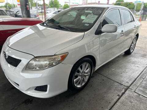 2009 Toyota Corolla for sale at Buy-Fast Autos in Houston TX