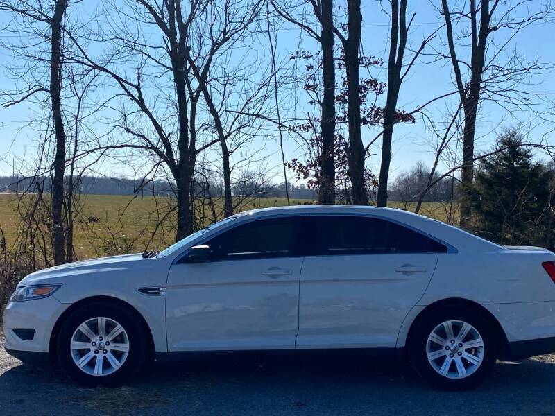 2010 Ford Taurus for sale at RAYBURN MOTORS in Murray KY