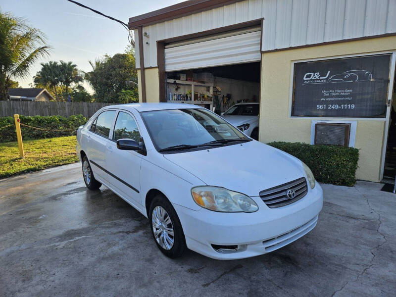 2003 Toyota Corolla for sale at O & J Auto Sales in Royal Palm Beach FL