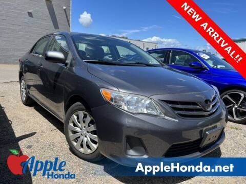 2013 Toyota Corolla for sale at APPLE HONDA in Riverhead NY