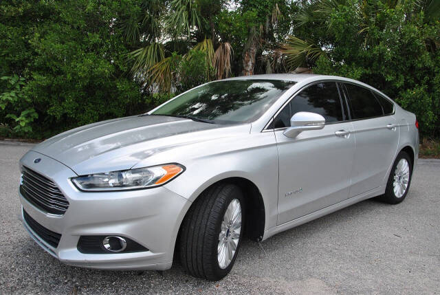 2014 Ford Fusion Hybrid for sale at Elite Auto Specialties LLC in Deland, FL