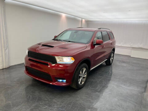 2014 Dodge Durango for sale at Roman's Auto Sales in Warren MI