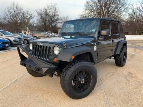2011 Jeep Wrangler Unlimited for sale at Crown Auto Group in Falls Church VA