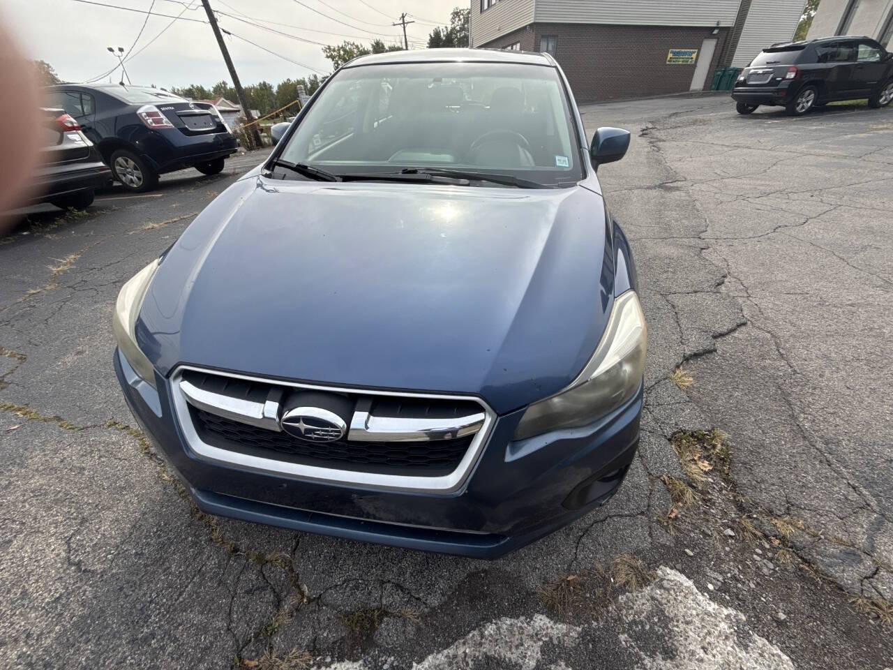 2013 Subaru Impreza for sale at Rochester Imports LLC in Webster, NY