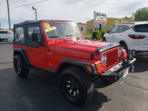 1997 Jeep Wrangler for sale at Holland's Auto Sales in Harrisonville MO
