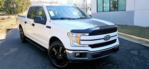 2018 Ford F-150 for sale at BOOST MOTORS LLC in Sterling VA