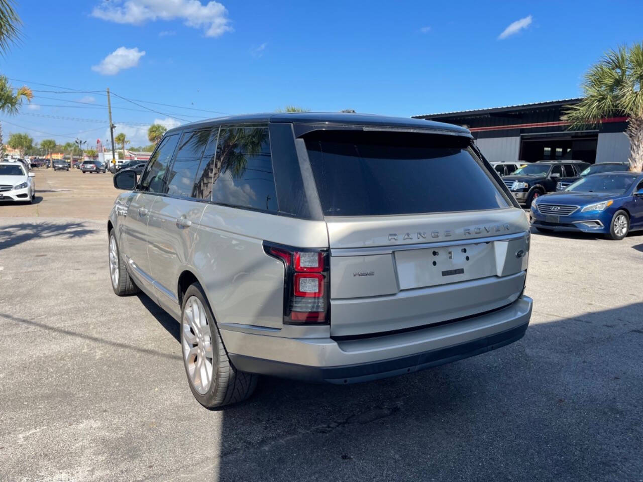 2014 Land Rover Range Rover for sale at SMART CHOICE AUTO in Pasadena, TX