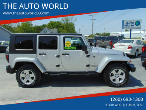 2010 Jeep Wrangler Unlimited for sale at THE AUTO WORLD in Churubusco IN