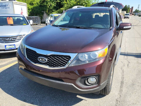 2012 Kia Sorento for sale at Howe's Auto Sales in Lowell MA