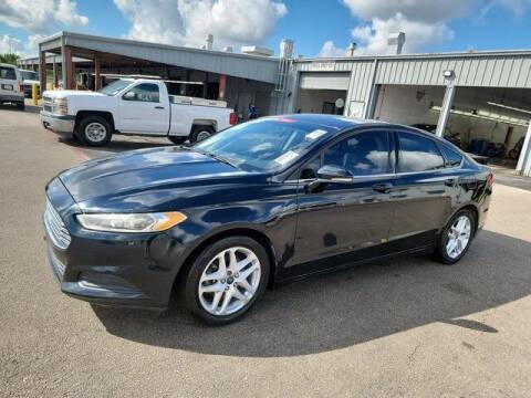 2014 Ford Fusion for sale at FREDY USED CAR SALES in Houston TX