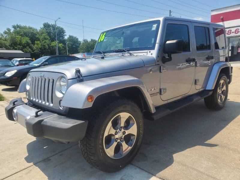 2016 Jeep Wrangler Unlimited for sale at Quallys Auto Sales in Olathe KS