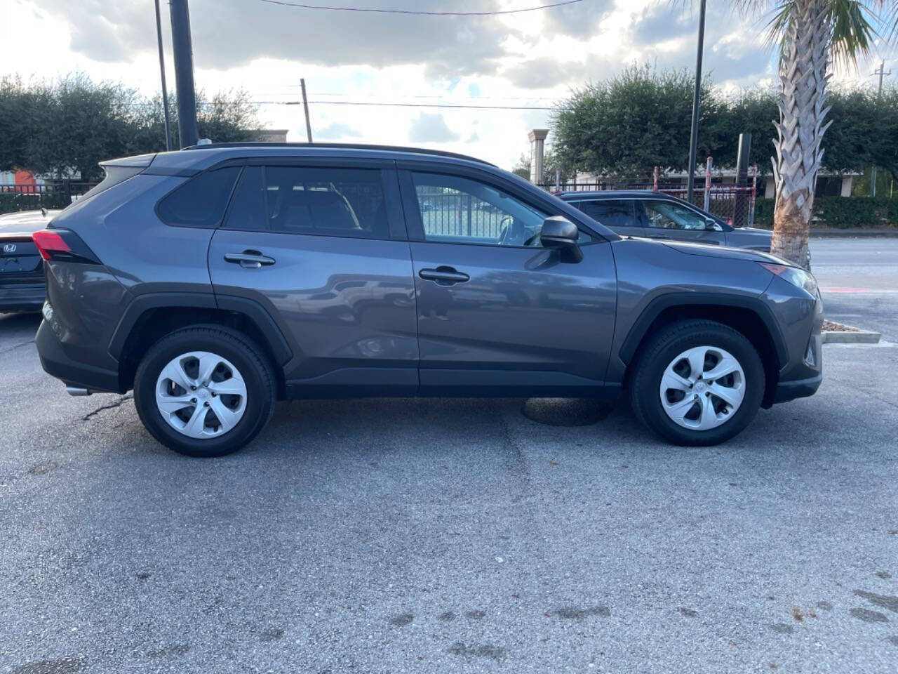 2019 Toyota RAV4 for sale at SMART CHOICE AUTO in Pasadena, TX