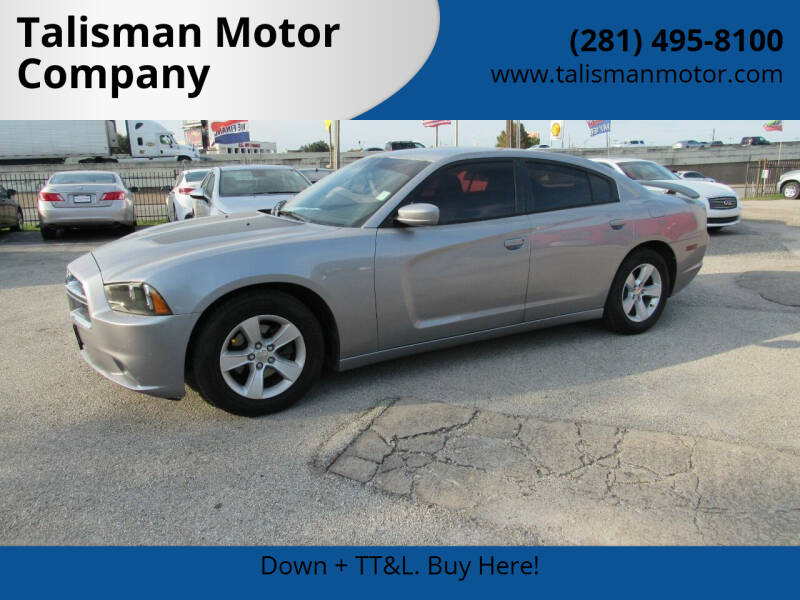 2013 Dodge Charger for sale at Talisman Motor Company in Houston TX