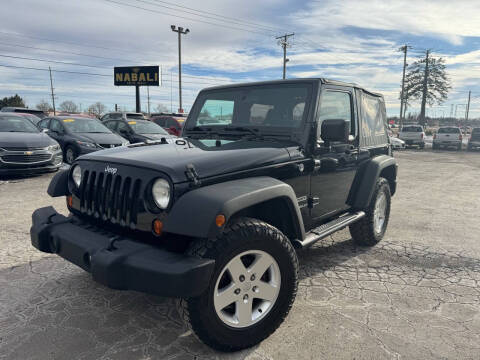 2012 Jeep Wrangler for sale at ALNABALI AUTO MALL INC. in Machesney Park IL