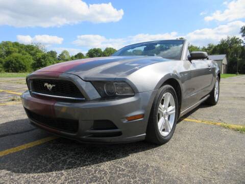 2013 Ford Mustang for sale at Caruzin Motors in Flint MI