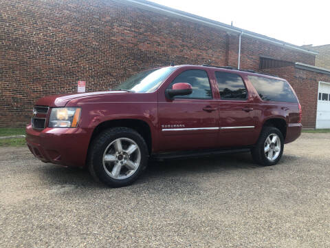 2011 Chevrolet Suburban for sale at Jim's Hometown Auto Sales LLC in Byesville OH