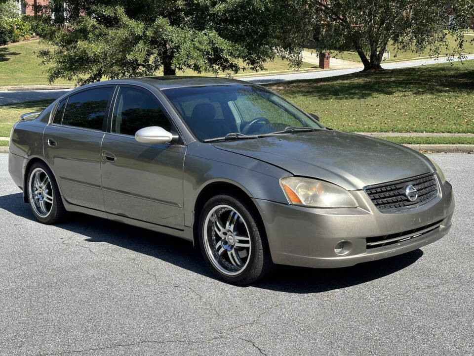 2004 Nissan Altima for sale at SHURE AUTO SALES in Snellville, GA