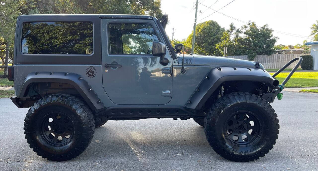2015 Jeep Wrangler  - $14,030