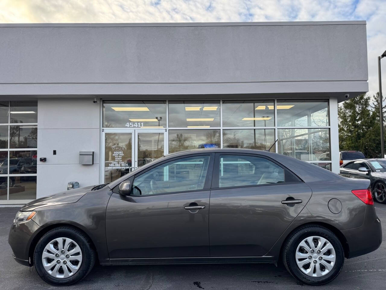 2011 Kia Forte for sale at Opus Motorcars in Utica, MI