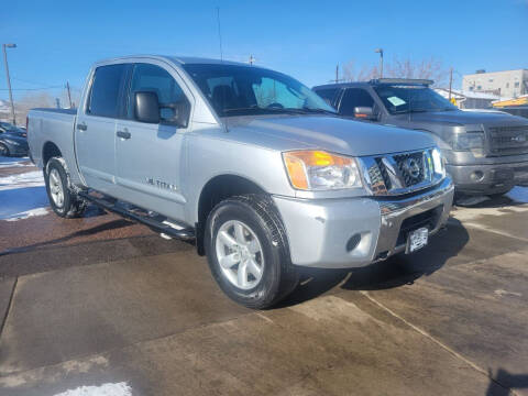 2009 Nissan Titan for sale at BERKENKOTTER MOTORS in Brighton CO