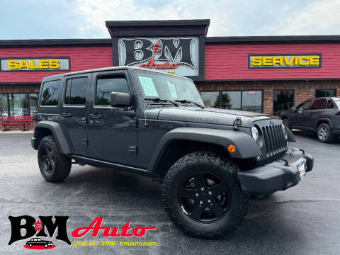 2017 Jeep Wrangler Unlimited for sale at B & M Auto Sales Inc. in Oak Forest IL
