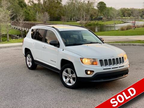 2014 Jeep Compass for sale at EASYCAR GROUP in Orlando FL