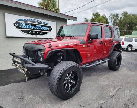 2013 Jeep Wrangler Unlimited for sale at Lake Helen Auto in Orange City FL