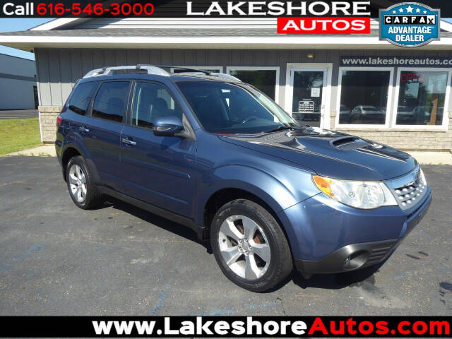 2011 Subaru Forester for sale at Lakeshore Autos in Holland, MI