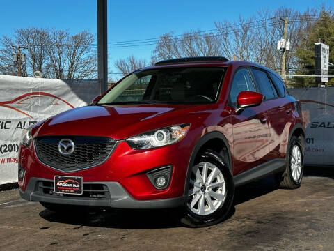 2013 Mazda CX-5 for sale at MAGIC AUTO SALES in Little Ferry NJ