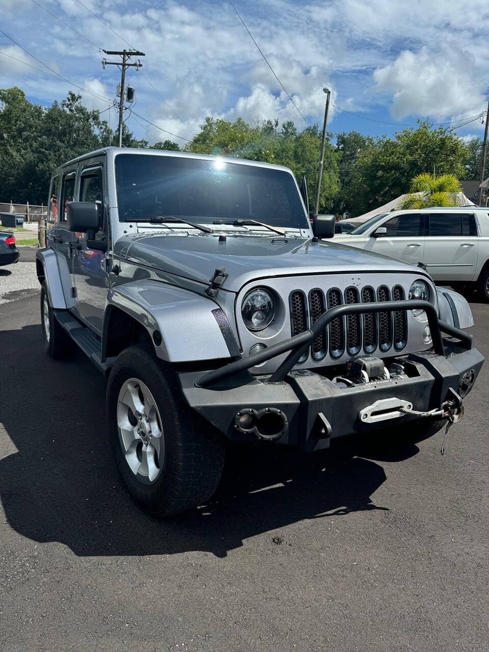 2014 Jeep Wrangler Unlimited for sale at PLANTATION MOTORS in Tampa, FL