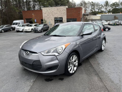 2016 Hyundai Veloster for sale at Atlanta Unique Auto Sales in Norcross GA