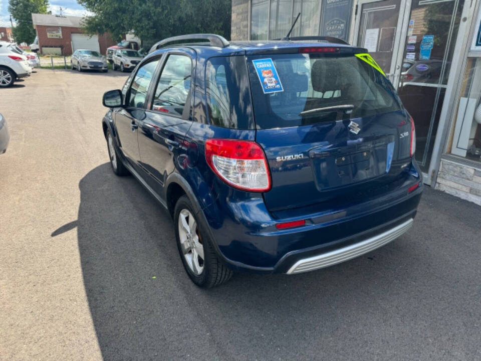 2011 Suzuki SX4 Crossover for sale at B N M Auto Sales Inc in New Castle, PA