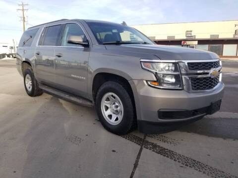 2018 Chevrolet Suburban for sale at KHAN'S AUTO LLC in Worland WY