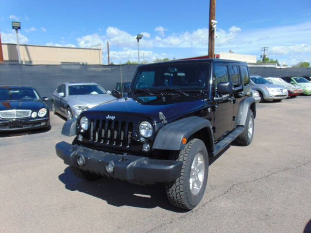 2014 Jeep Wrangler Unlimited for sale at Avalanche Auto Sales in Denver, CO