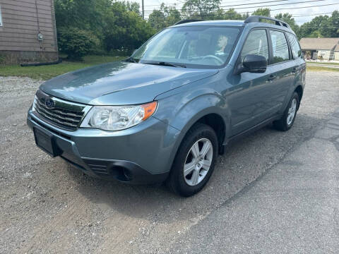 2010 Subaru Forester for sale at Minnix Auto Sales LLC in Cuyahoga Falls OH