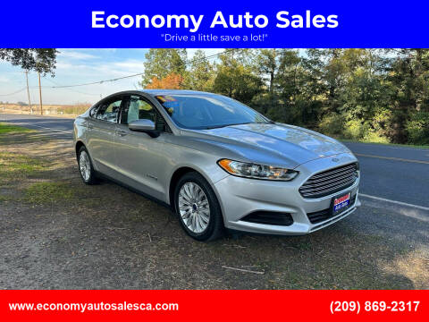 2014 Ford Fusion Hybrid for sale at Economy Auto Sales in Riverbank CA