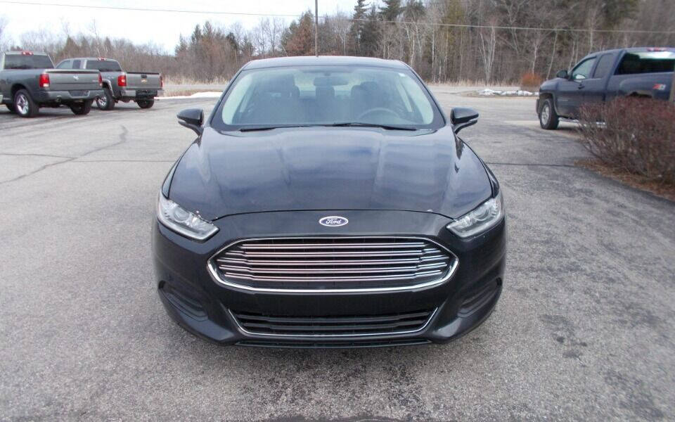 2015 Ford Fusion for sale at Galvanek's in Cadillac, MI