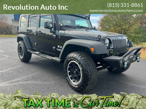 2009 Jeep Wrangler Unlimited for sale at Revolution Auto Inc in McHenry IL