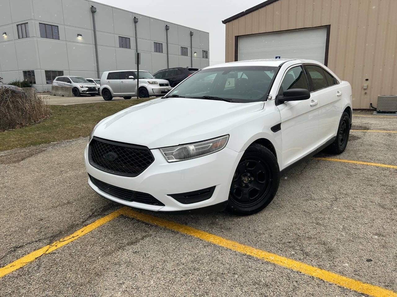 2016 Ford Taurus for sale at The Motor House in Oswego, IL