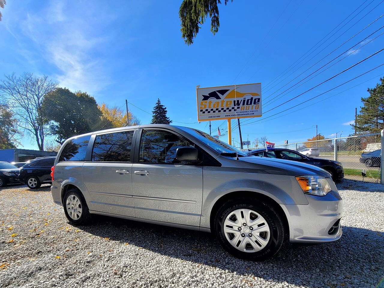 2014 Dodge Grand Caravan for sale at Statewide Auto LLC in Akron, OH