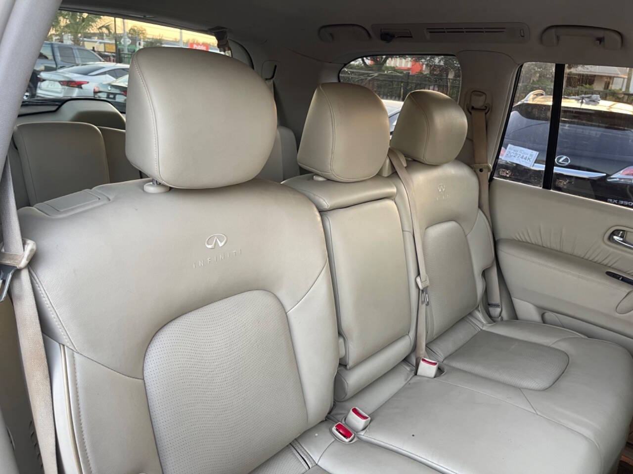 2014 INFINITI QX80 for sale at SMART CHOICE AUTO in Pasadena, TX