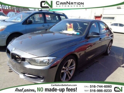 2013 BMW 3 Series for sale at CarNation AUTOBUYERS Inc. in Rockville Centre NY