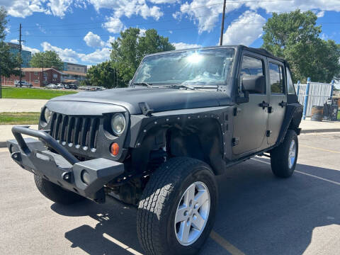 2012 Jeep Wrangler Unlimited for sale at Mister Auto in Lakewood CO