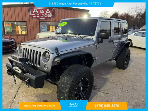 2015 Jeep Wrangler Unlimited for sale at A & A Auto Sales in Fayetteville AR