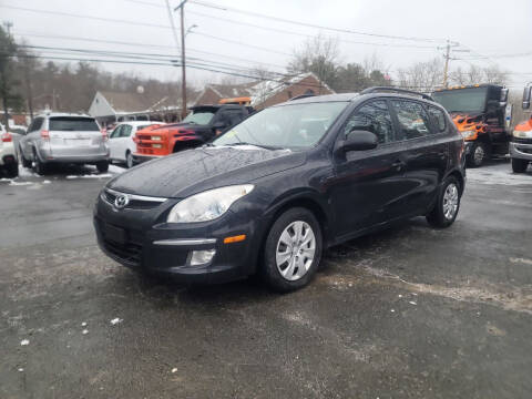 2010 Hyundai Elantra Touring for sale at Hometown Automotive Service & Sales in Holliston MA