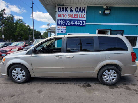 2014 Dodge Grand Caravan for sale at Oak & Oak Auto Sales in Toledo OH